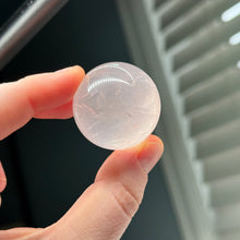 Load image into Gallery viewer, Icy Pink Mozambique Rose Quartz Sphere with strong Asterism