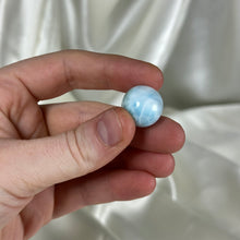 Load image into Gallery viewer, Baby Blue and Sea Green Chatoyant Larimar Sphere
