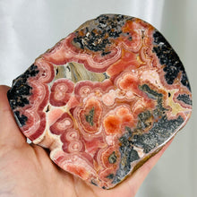 Load image into Gallery viewer, AA Rhodochrosite Slab with Gel Tones, Stalactites, and Pyrite (comes with stand)