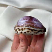 Load image into Gallery viewer, Purple Cowrie with Painted Gemini Zodiac Design