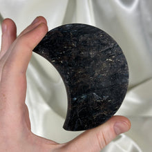 Load image into Gallery viewer, Arfvedsonite with Garnet Moon Carving on Stand B