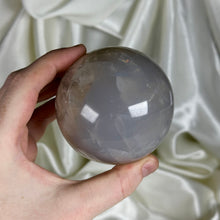 Load image into Gallery viewer, Glowy Blue Rose Quartz Sphere with Smoky Quartz