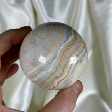 Load image into Gallery viewer, 10oz Banded Calcite & Agate “Creamsicle” Sphere