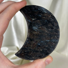 Load image into Gallery viewer, Arfvedsonite with Garnet Moon Carving on Stand A