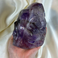 Load image into Gallery viewer, XXL Amethyst Skull Carving on Custom Gold Stand