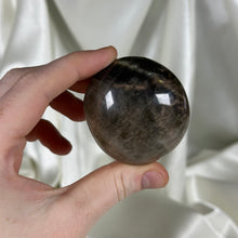 Load image into Gallery viewer, Black Moonstone Palmstone with Rainbows