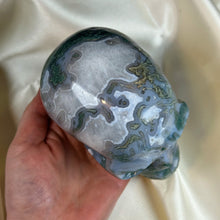 Load image into Gallery viewer, XXL “Overgrown” Moss Agate Skull Carving