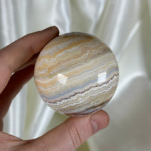 Load image into Gallery viewer, 8oz Banded Calcite & Agate “Creamsicle” Sphere