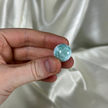 Load image into Gallery viewer, Baby Blue and Sea Green Chatoyant Larimar Sphere