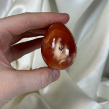 Load image into Gallery viewer, Quartzy Carnelian with Orca Agate Egg Carving