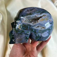 Load image into Gallery viewer, XXL “Druzy Forest” Moss Agate Skull Carving