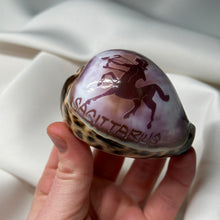 Load image into Gallery viewer, Purple Cowrie with Painted Sagittarius Zodiac Design