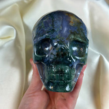 Load image into Gallery viewer, XXL “Druzy Forest” Moss Agate Skull Carving