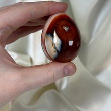 Load image into Gallery viewer, Striped Carnelian with Orca Agate Egg Carving