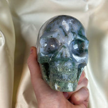 Load image into Gallery viewer, XXL “Overgrown” Moss Agate Skull Carving
