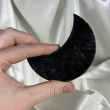 Load image into Gallery viewer, Arfvedsonite with Garnet Moon Carving on Stand D