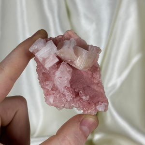 Pink Halite Cluster on Dark Pink Plate