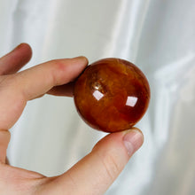 Load image into Gallery viewer, Carnelian Palmstone with Sparkly Druzy Center
