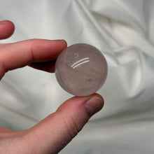 Load image into Gallery viewer, Icy Pink Mozambique Rose Quartz Sphere with strong Asterism
