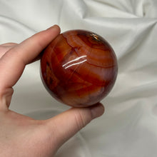 Load image into Gallery viewer, Pop of Purple Carnelian Sphere (12.4oz)
