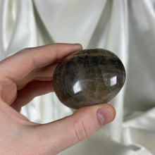 Load image into Gallery viewer, Black Moonstone Palmstone with Rainbows
