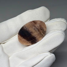 Load image into Gallery viewer, Black Sunstone Cabochon 44.15ct
