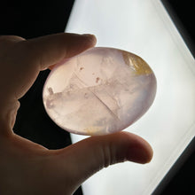 Load image into Gallery viewer, Jelly Rose Quartz Palmstone with Golden Healer
