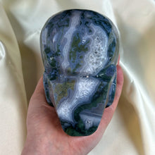 Load image into Gallery viewer, XXL “Druzy Forest” Moss Agate Skull Carving
