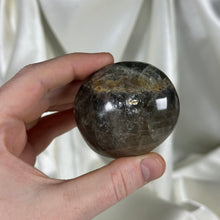 Load image into Gallery viewer, Black Moonstone Palmstone with Rainbows
