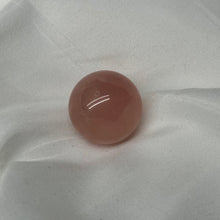 Load image into Gallery viewer, Deep Peachy Pink Mozambique Rose Quartz Sphere with Asterism
