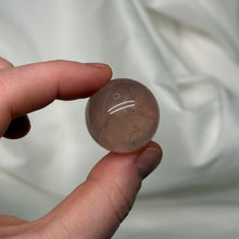 Load image into Gallery viewer, Deep Peachy Pink Mozambique Rose Quartz Sphere with Asterism
