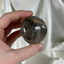 Load image into Gallery viewer, Black Moonstone Palmstone with Rainbows
