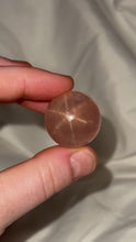 Load and play video in Gallery viewer, Deep Peachy Pink Mozambique Rose Quartz Sphere with Asterism
