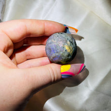 Load image into Gallery viewer, Rare Purple Labradorite Full Moon Sphere Carving 2
